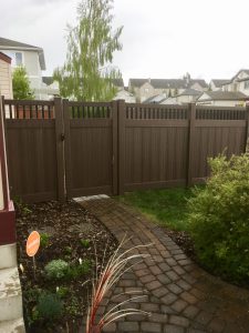 Six foot privacy fence in a backyard in Calgary.